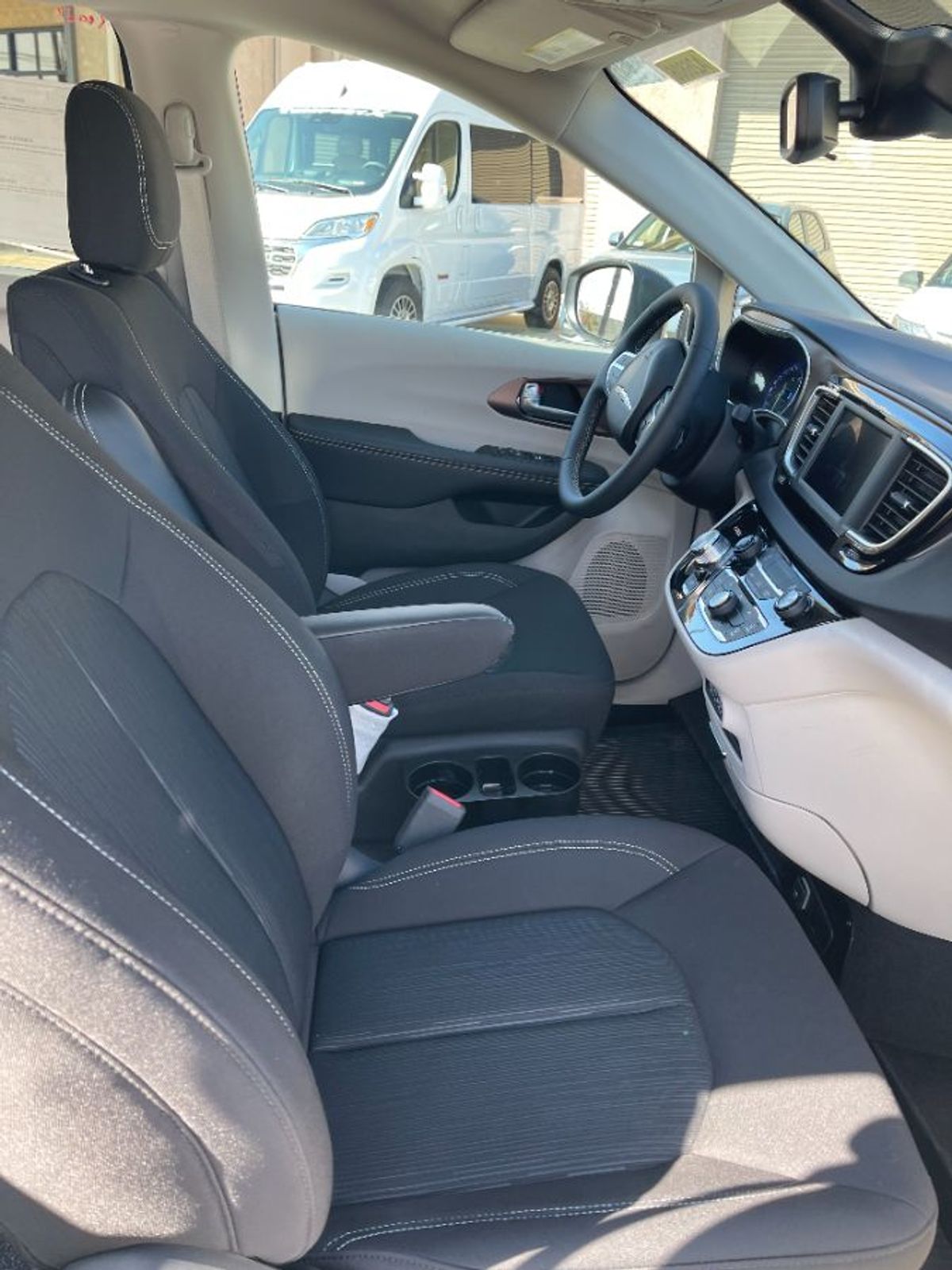 White Chrysler Voyager with Side Entry Automatic Fold Out ramp