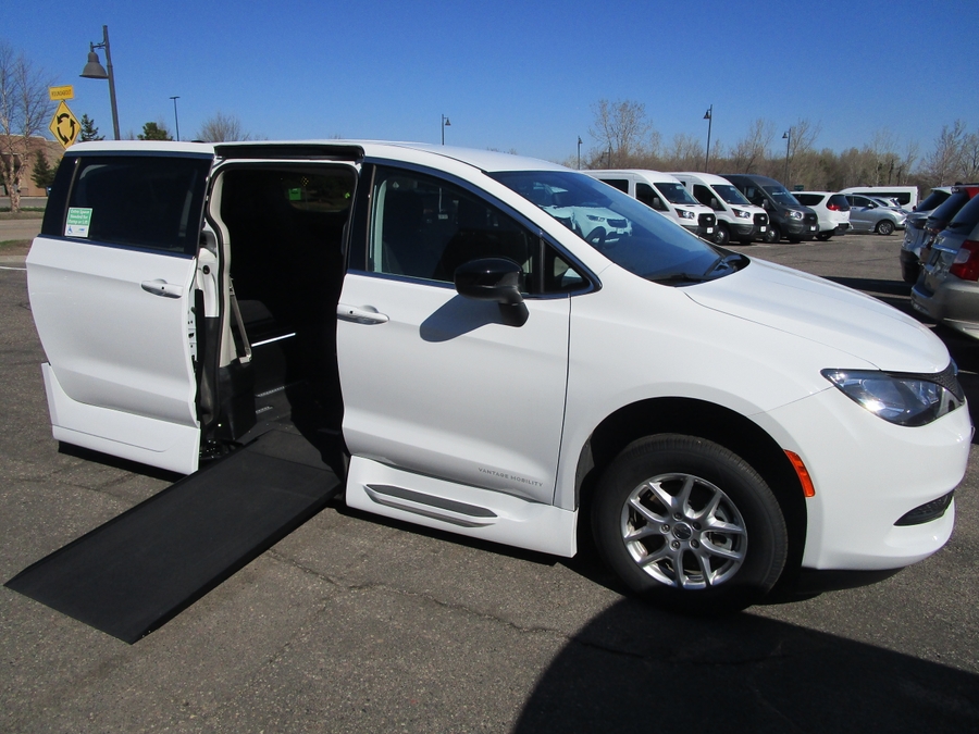 White Chrysler Voyager with Side Entry Automatic In Floor ramp