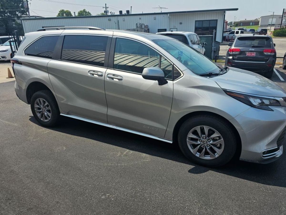 Silver Toyota Sienna with Rear Entry Manual Fold Out ramp