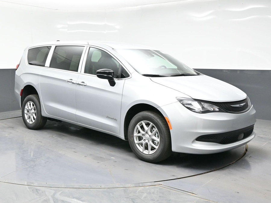 Silver Chrysler Voyager with Rear Entry Manual Fold Out ramp