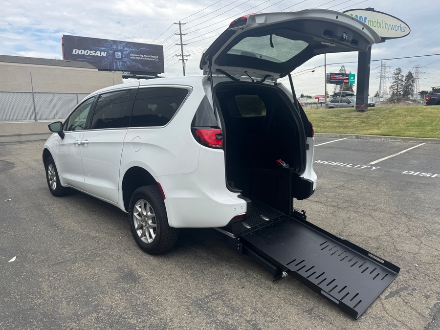 White Chrysler Pacifica with Rear Entry Manual Fold Out ramp