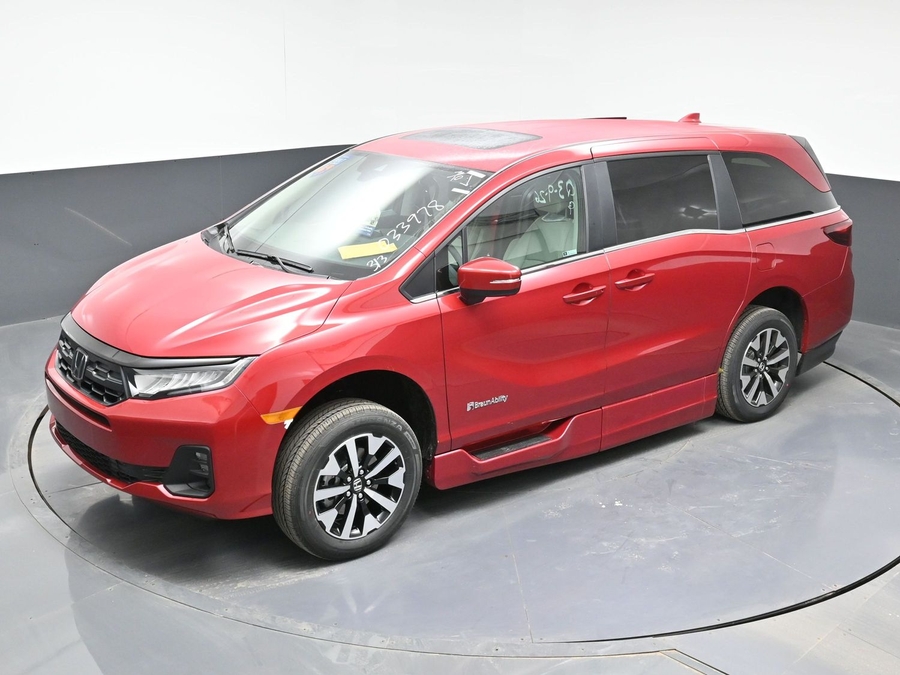 Red Honda Odyssey image number 11