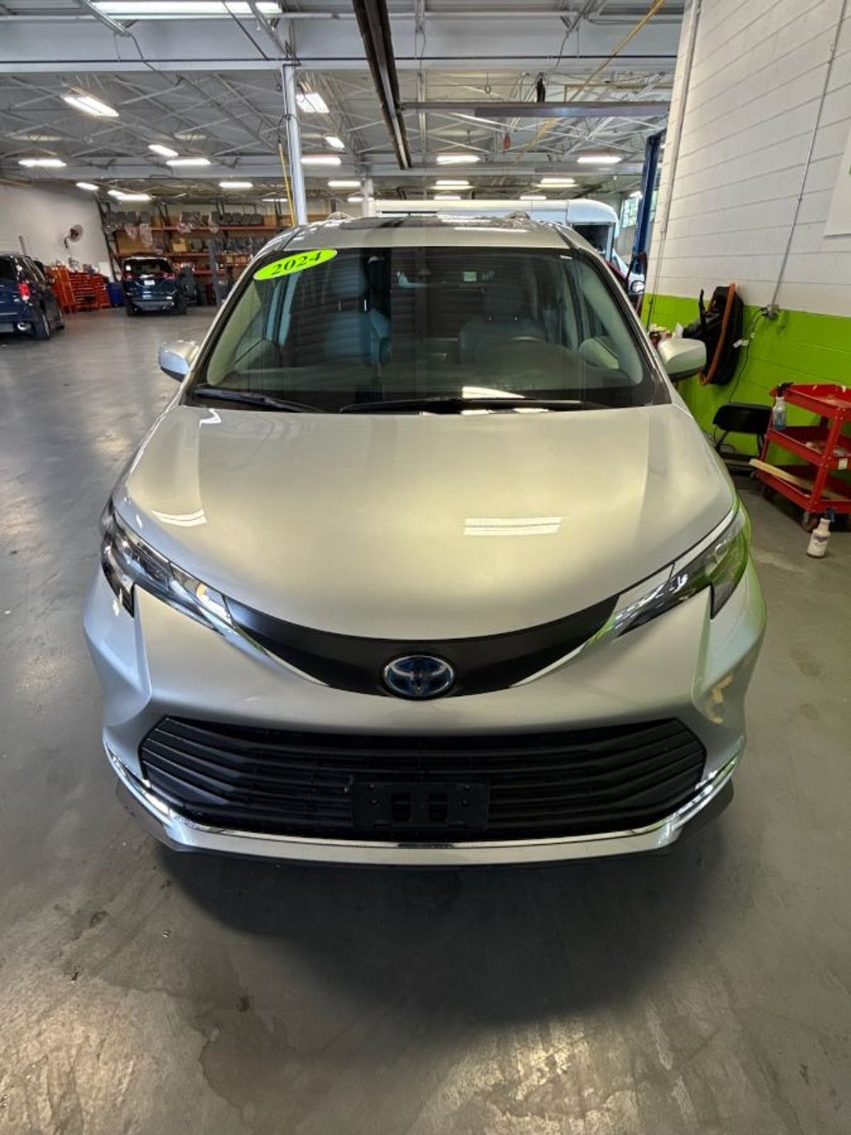 Silver Toyota Sienna with Rear Entry Manual Fold Out ramp