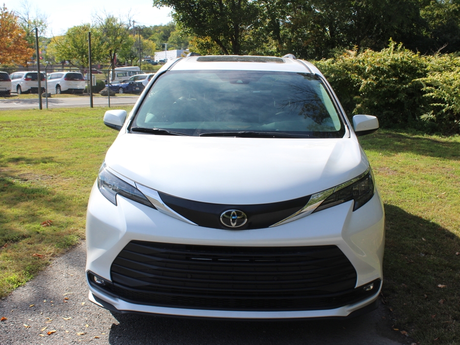 White Toyota Sienna with Rear Entry Manual Fold Out ramp