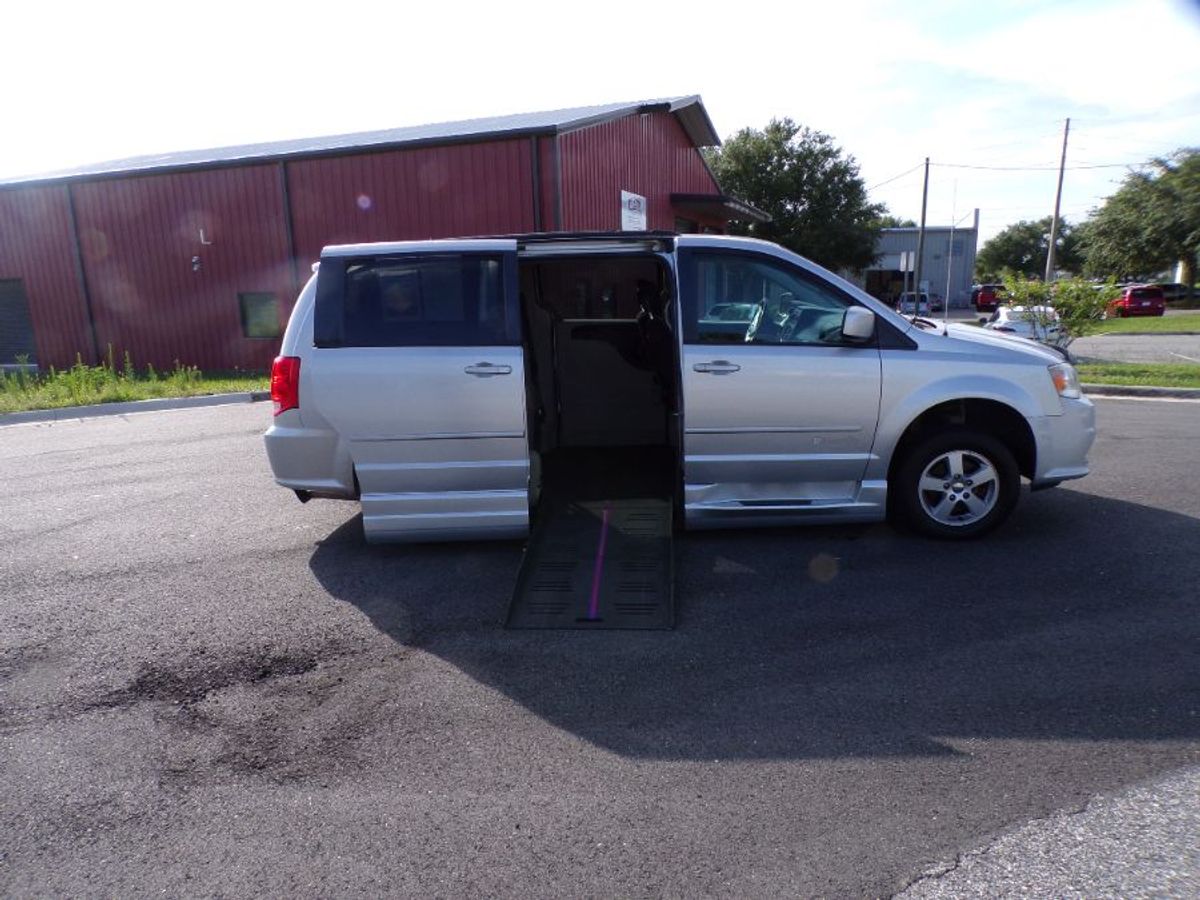 Silver Dodge Grand Caravan with Side Entry Automatic Fold Out ramp