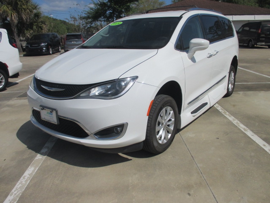 White Chrysler Pacifica with Side Entry Automatic In Floor ramp