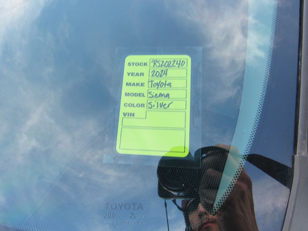 Silver Toyota Sienna with Rear Entry Manual Fold Out ramp