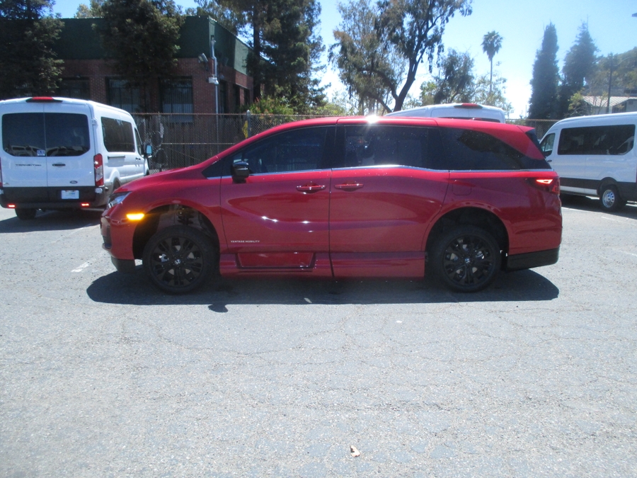 Red Honda Odyssey with Side Entry Automatic In Floor ramp
