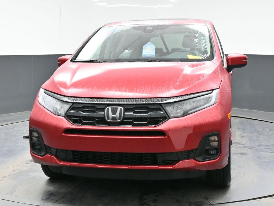 Red Honda Odyssey image number 1