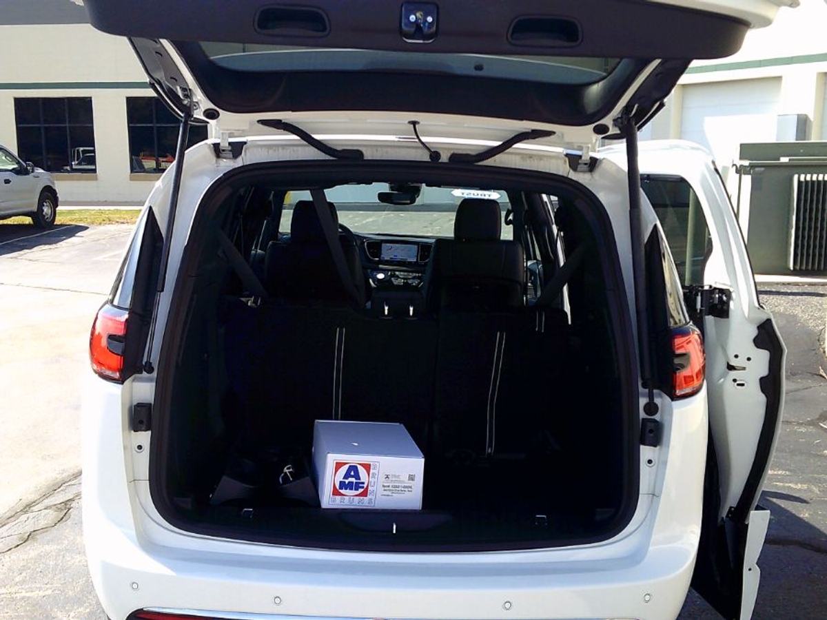 White Chrysler Pacifica with Side Entry Automatic In Floor ramp