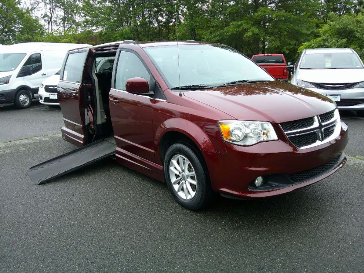Red Dodge Grand Caravan image number 1
