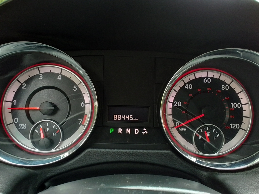 Brown Dodge Grand Caravan with Side Entry Manual In Floor ramp