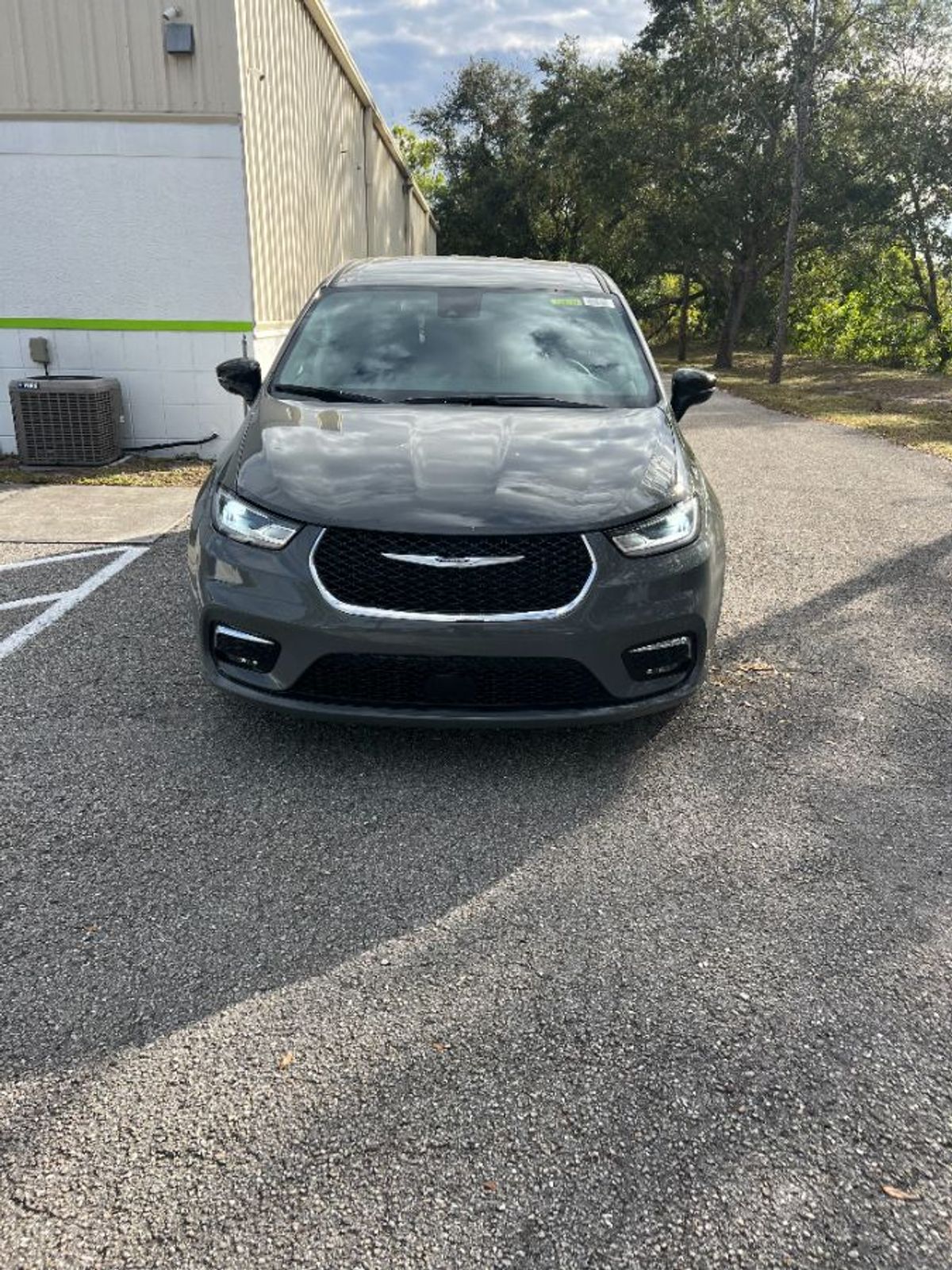 Grey Chrysler Pacifica with Rear Entry Manual Fold Out ramp