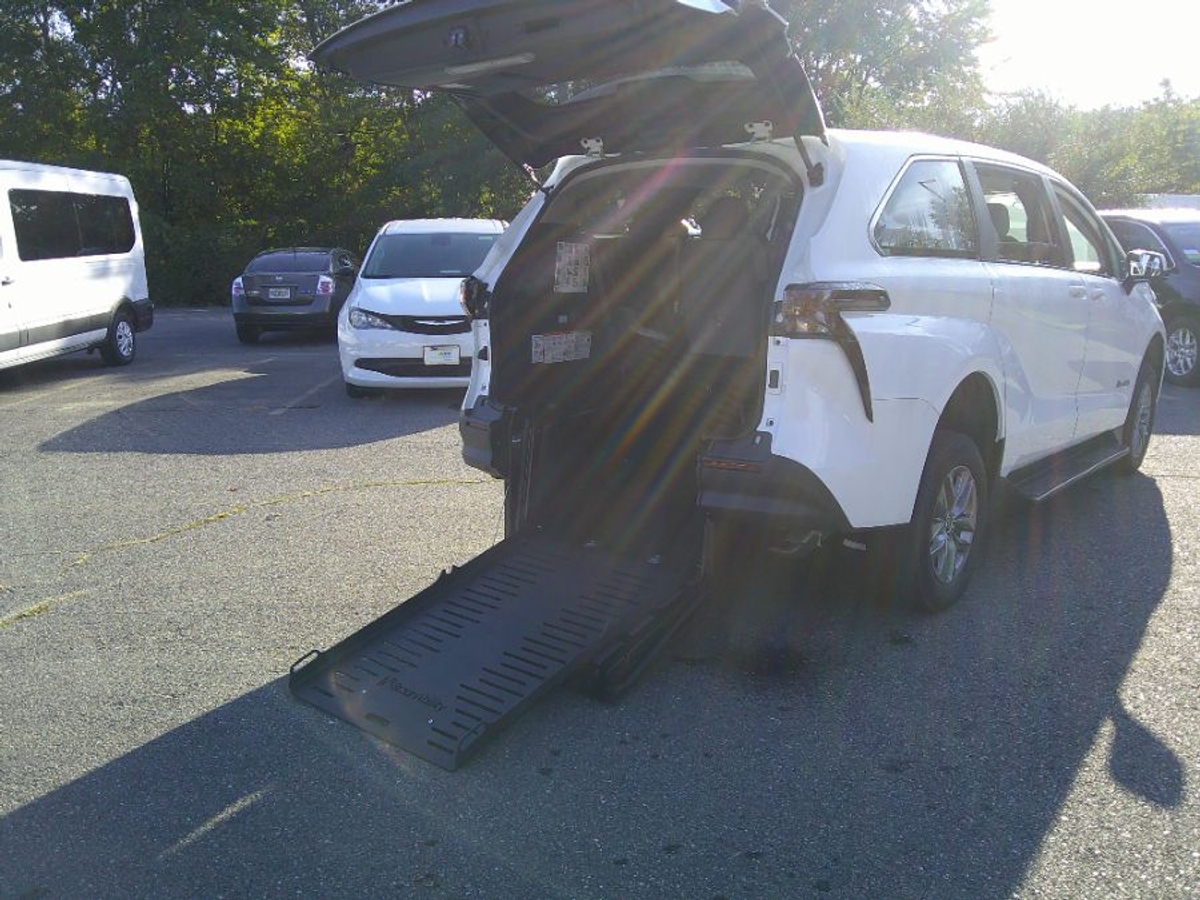 White Toyota Sienna with Rear Entry Manual Fold Out ramp
