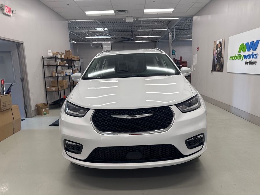 White Chrysler Pacifica with Side Entry Automatic In Floor ramp