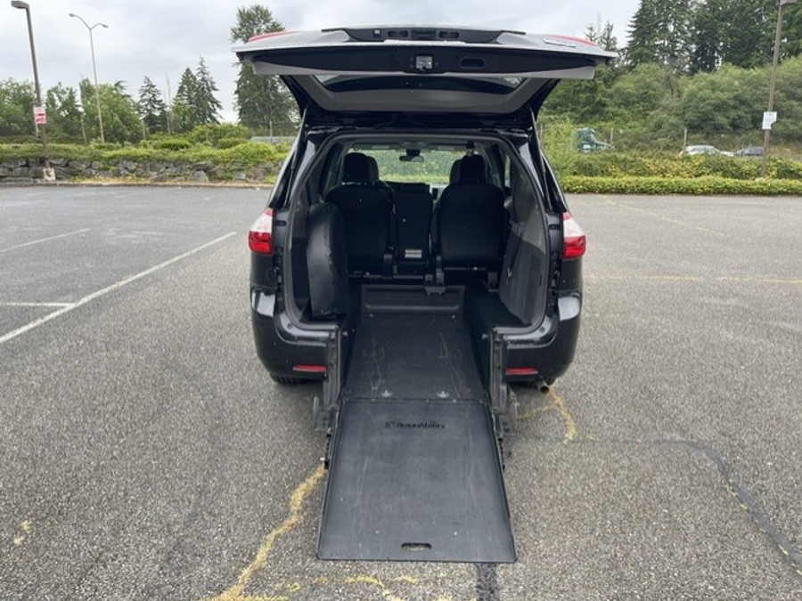 Black Toyota Sienna with Rear Entry Manual Fold Out ramp