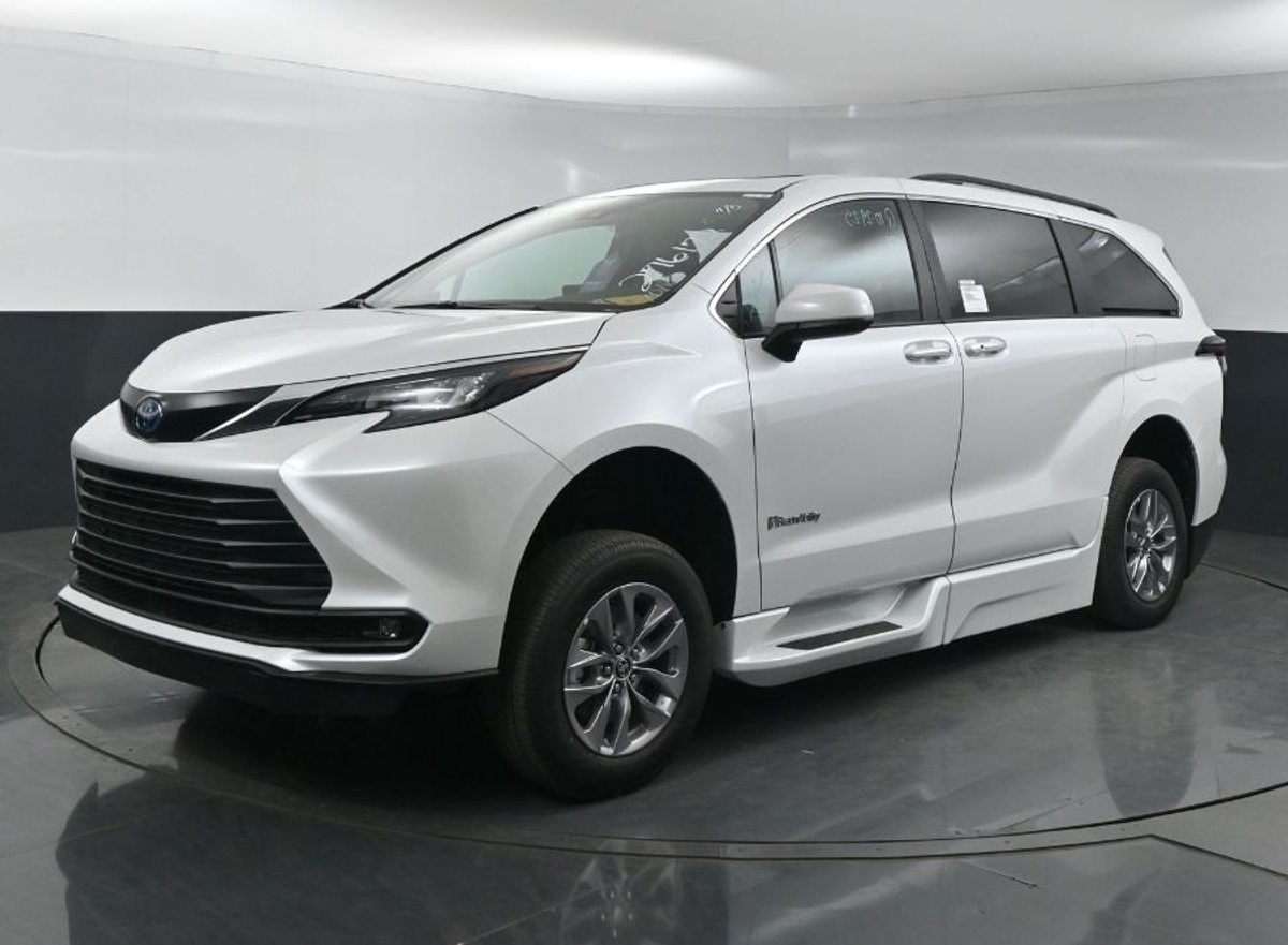 White Toyota Sienna with Side Entry Automatic Fold Out ramp