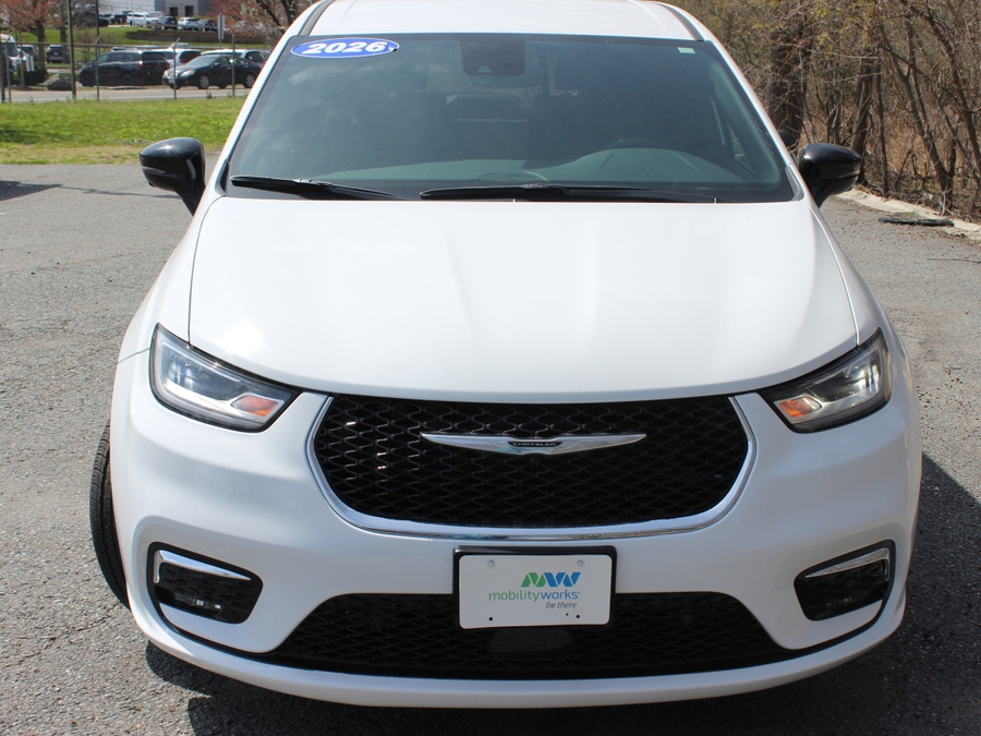 White Chrysler Pacifica with Rear Entry Manual Fold Out ramp