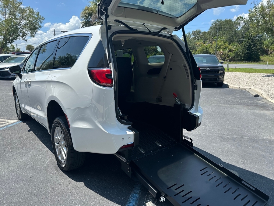 White Chrysler Pacifica with Rear Entry Manual Fold Out ramp