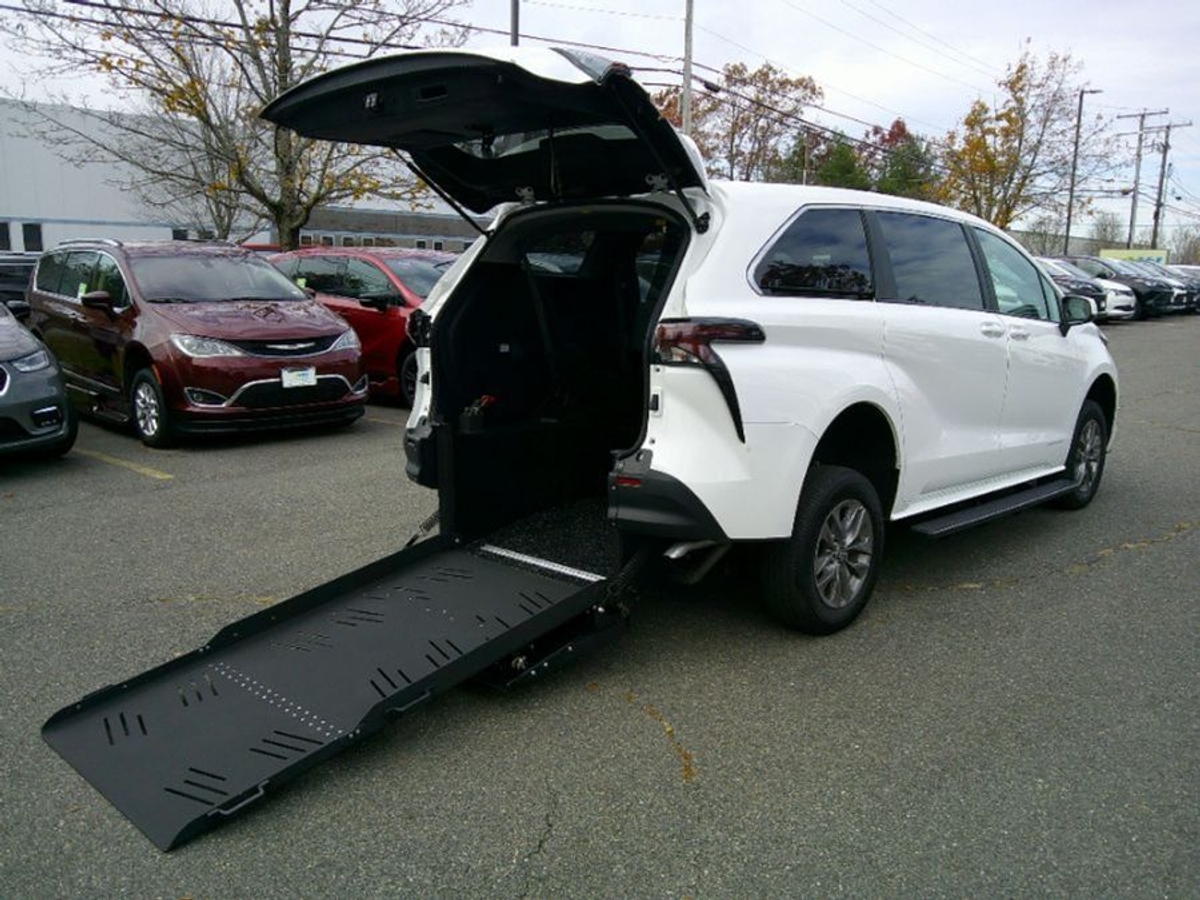 White Toyota Sienna with Rear Entry Manual Fold Out ramp