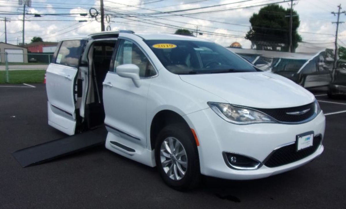 White Chrysler Pacifica with Side Entry Automatic In Floor ramp