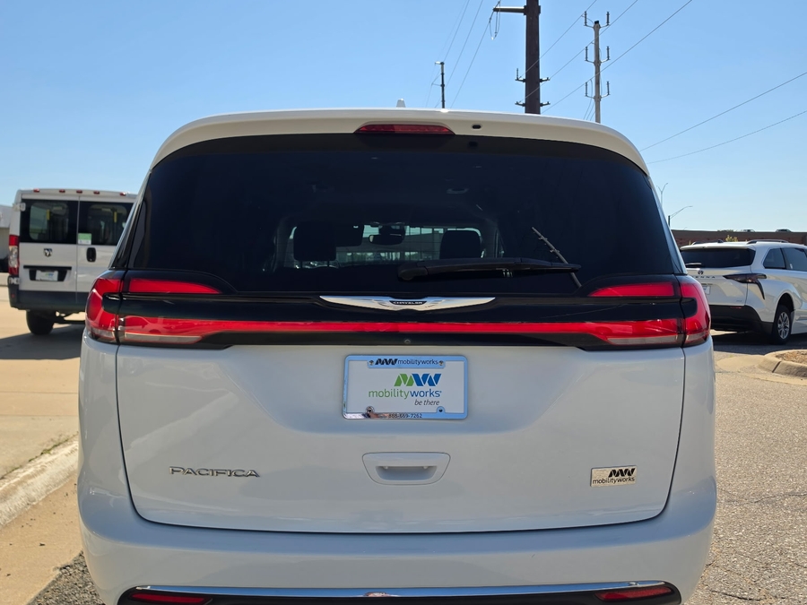 White Chrysler Pacifica with Side Entry Automatic In Floor ramp