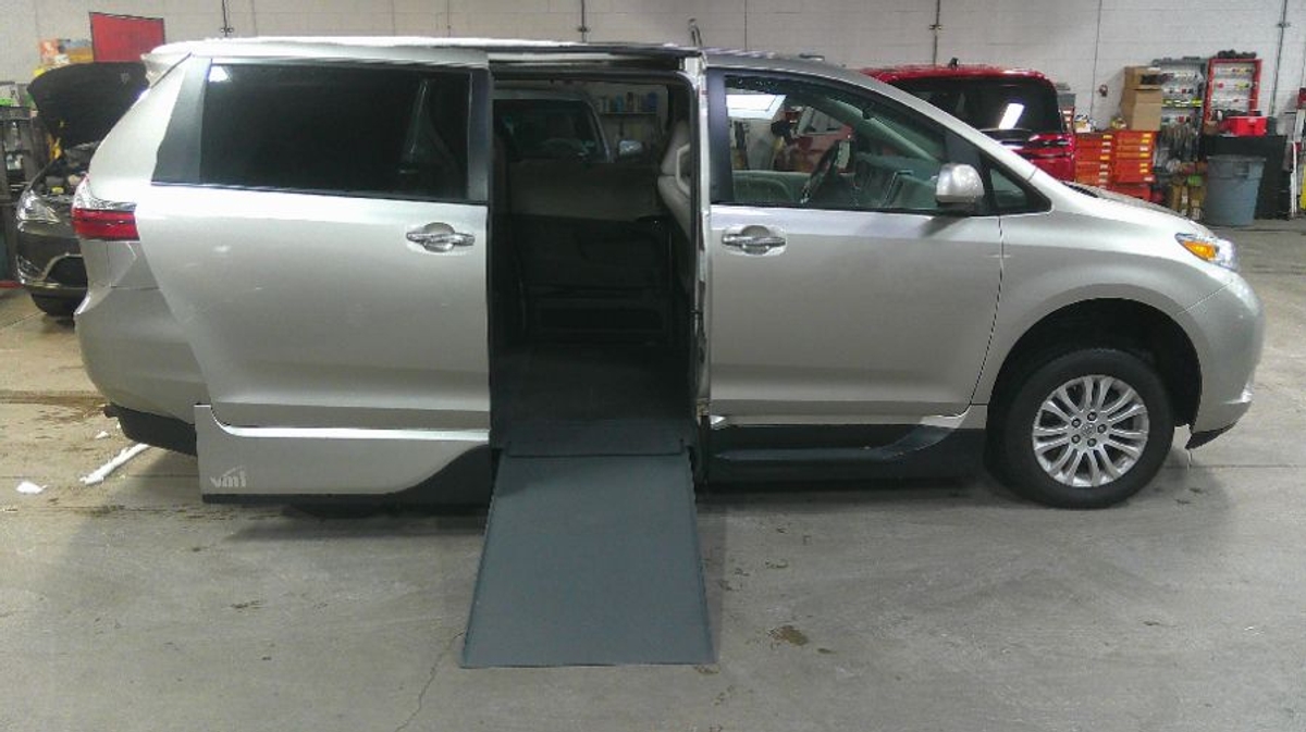 Gold Toyota Sienna with Side Entry Automatic In Floor ramp