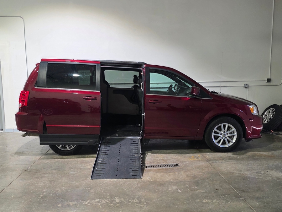 Red Dodge Grand Caravan with Side Entry Automatic Fold Out ramp