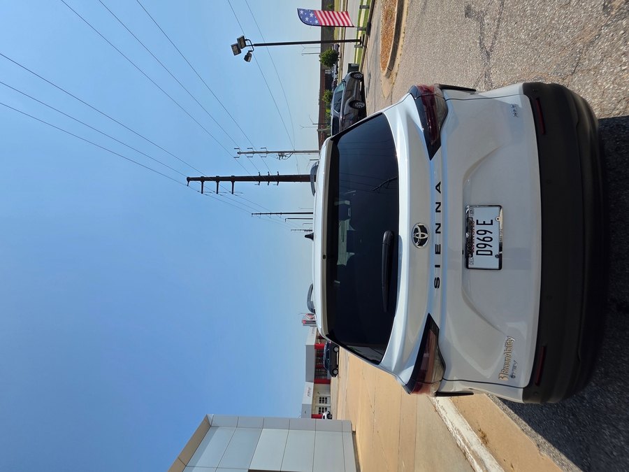White Toyota Sienna with Side Entry Automatic Fold Out ramp