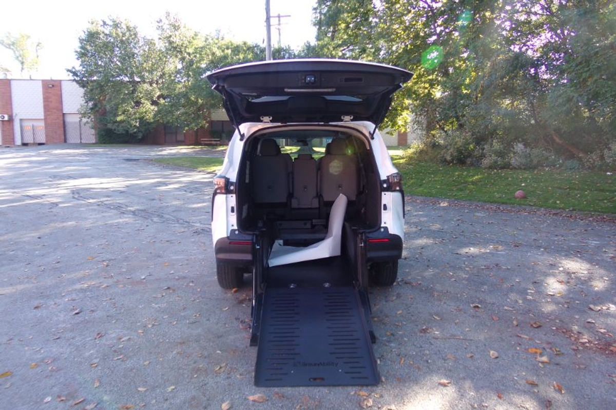 White Toyota Sienna with Rear Entry Manual Fold Out ramp