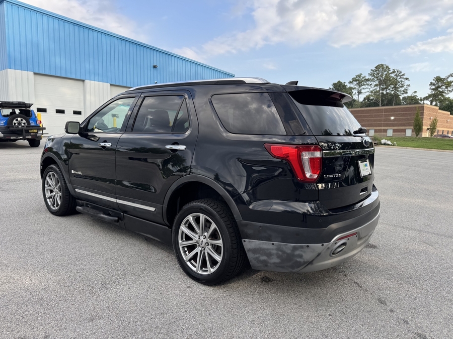 Black Ford Explorer image number 2