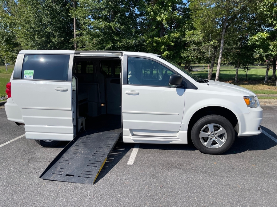 White Dodge Grand Caravan with Side Entry Automatic Fold Out ramp