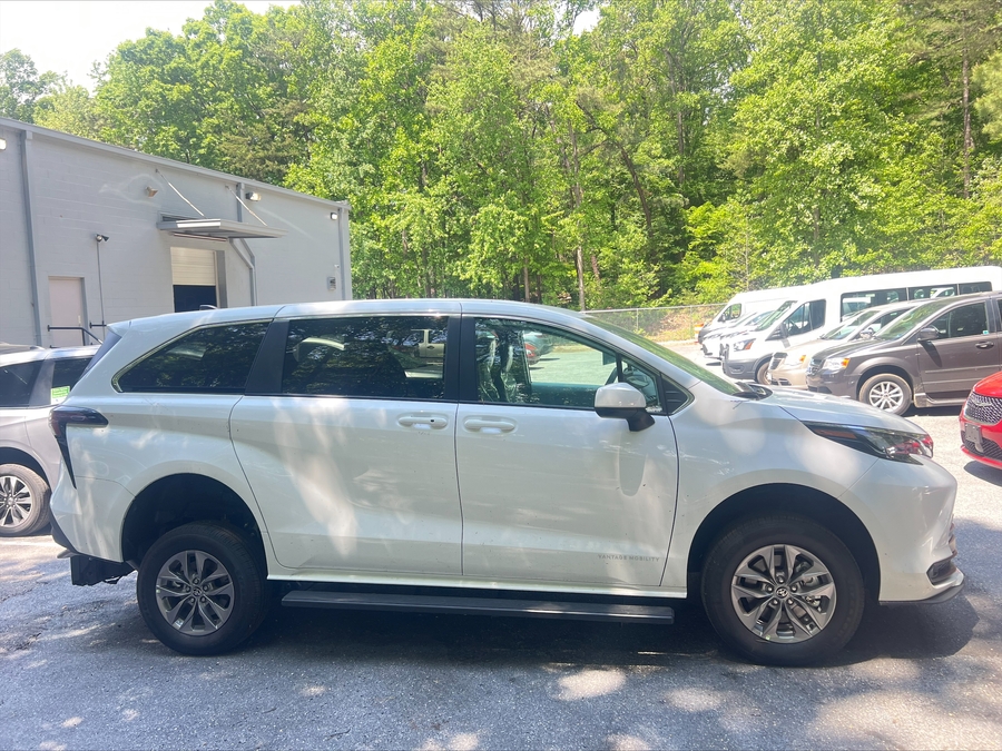 White Toyota Sienna with Rear Entry Manual Fold Out ramp