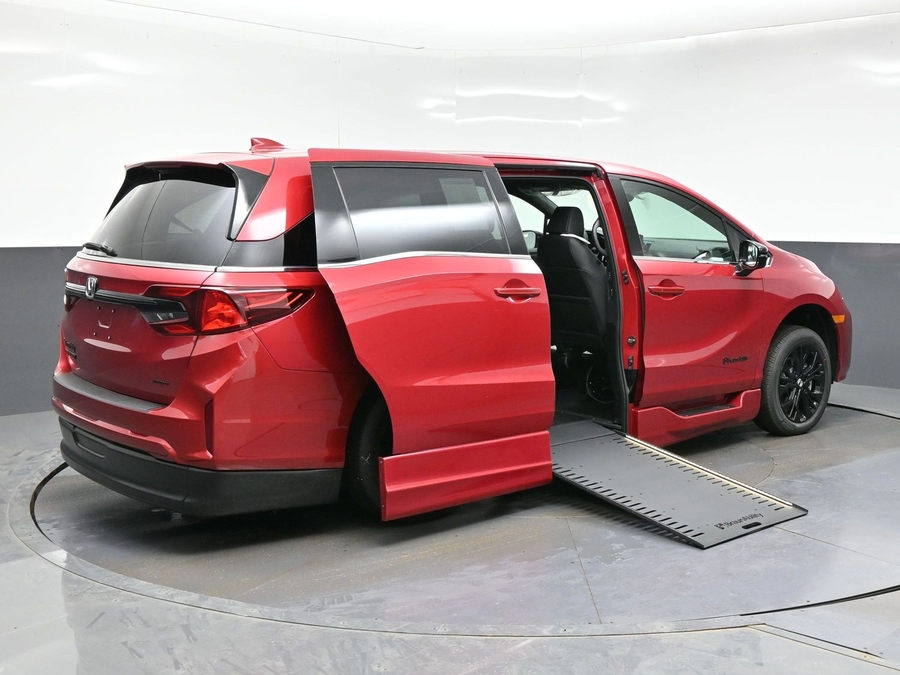 Red Honda Odyssey with Side Entry Automatic In Floor ramp