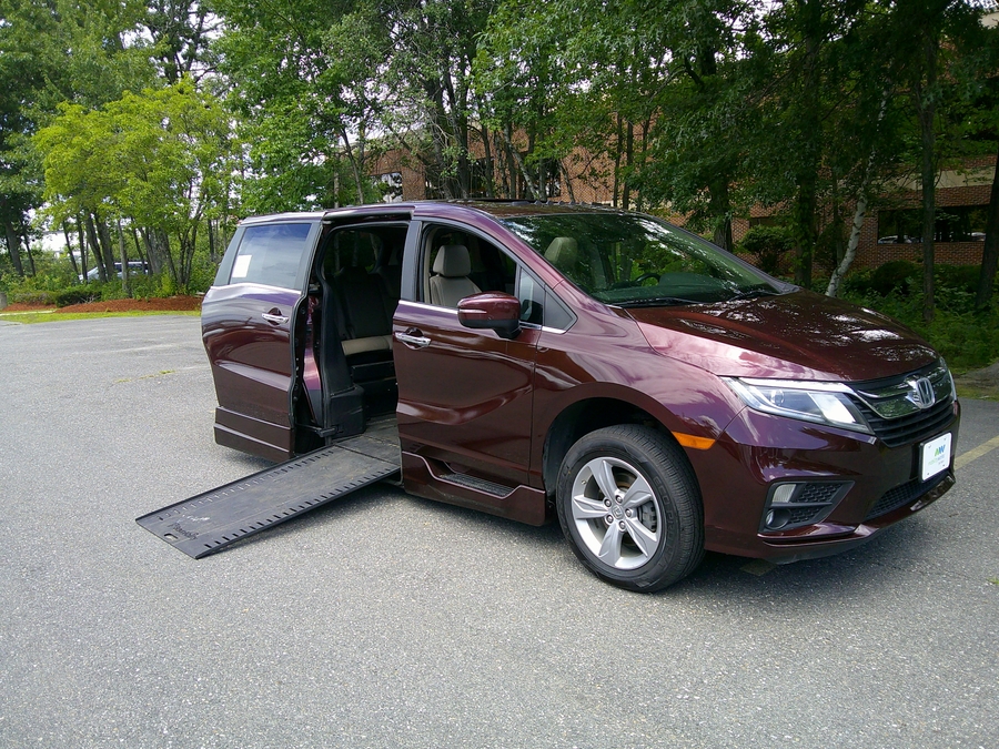 Red Honda Odyssey with Side Entry Automatic In Floor ramp