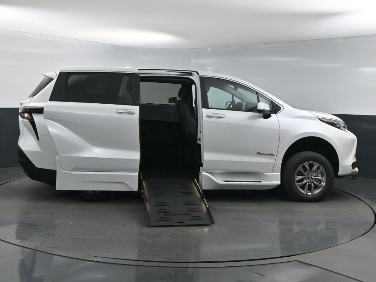 White Toyota Sienna with Side Entry Automatic Fold Out ramp