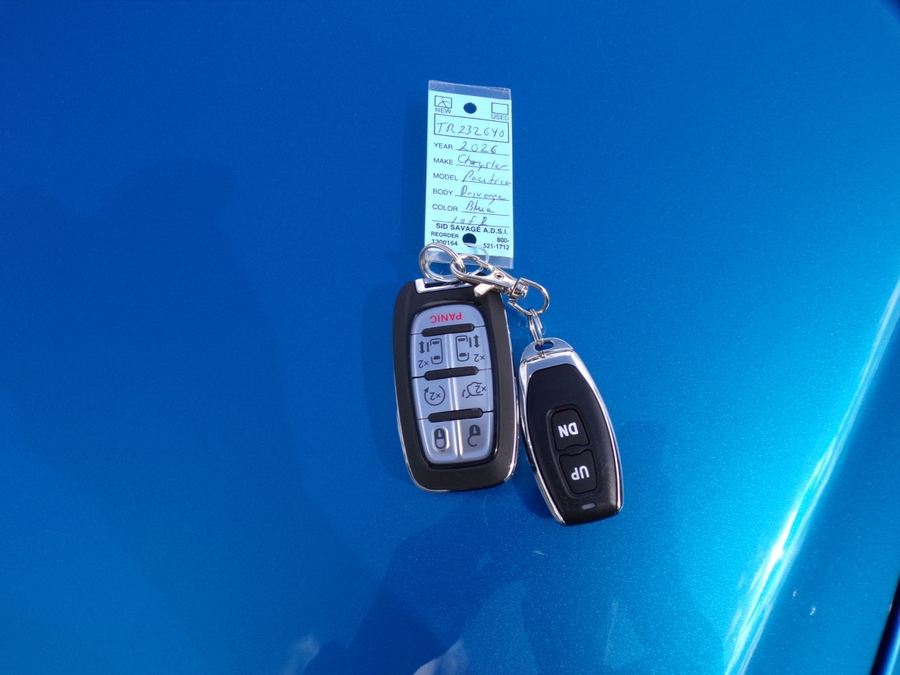 Blue Chrysler Pacifica with Side Entry Automatic Fold Out ramp