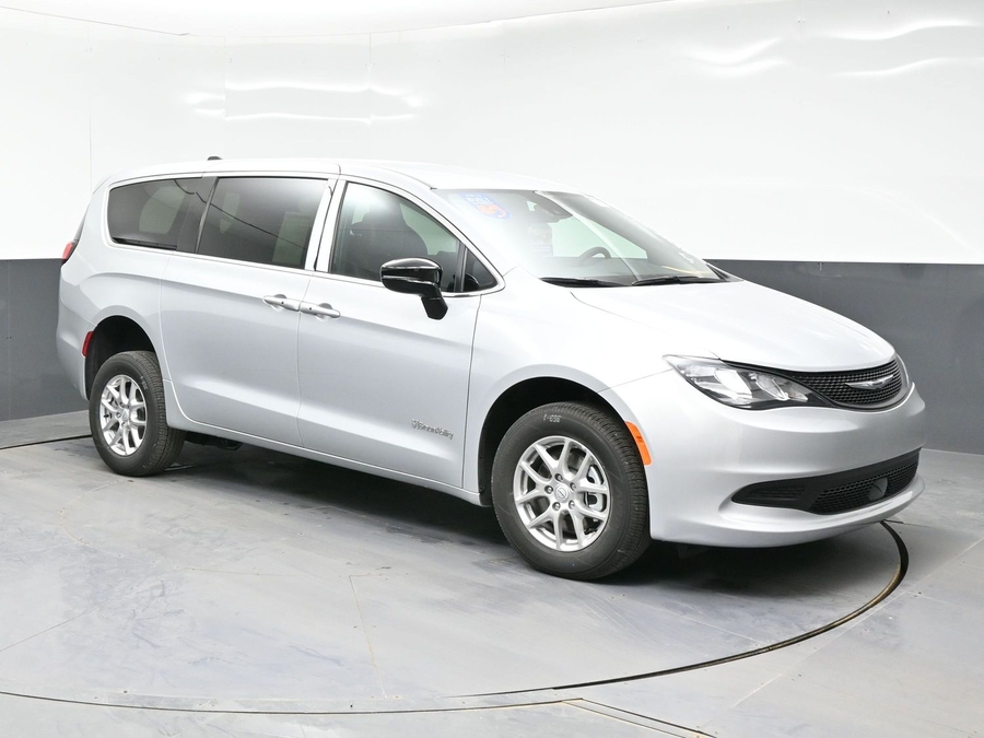 Silver Chrysler Voyager with Rear Entry Manual Fold Out ramp