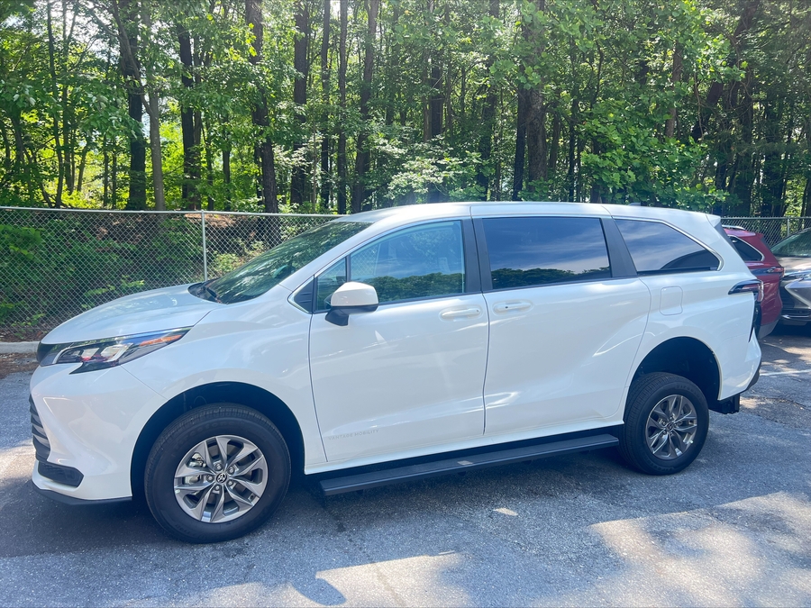 White Toyota Sienna with Rear Entry Manual Fold Out ramp