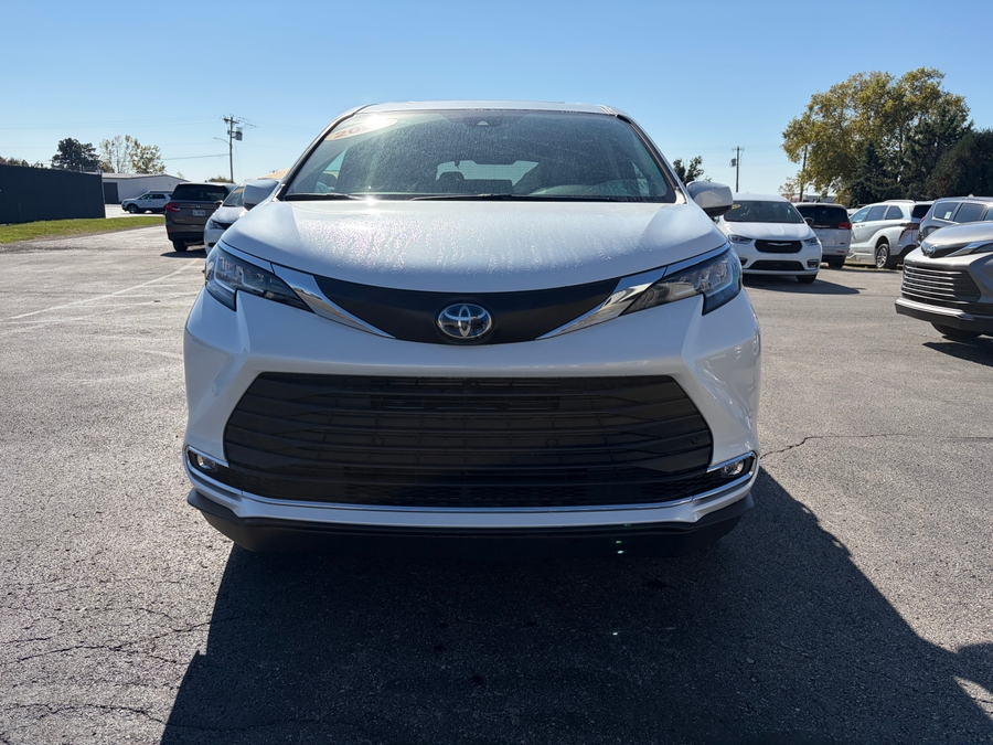 White Toyota Sienna with Side Entry Automatic Fold Out ramp