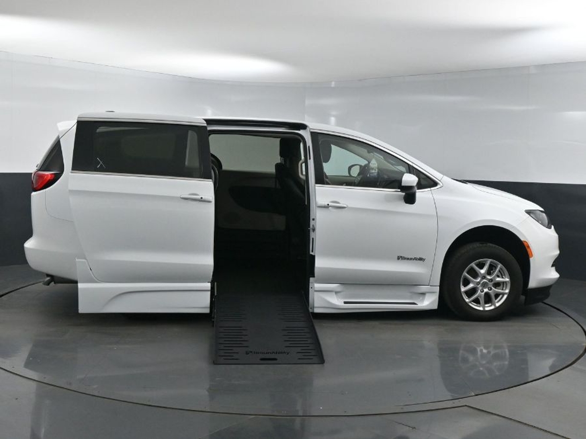 White Chrysler Voyager with Side Entry Automatic Fold Out ramp