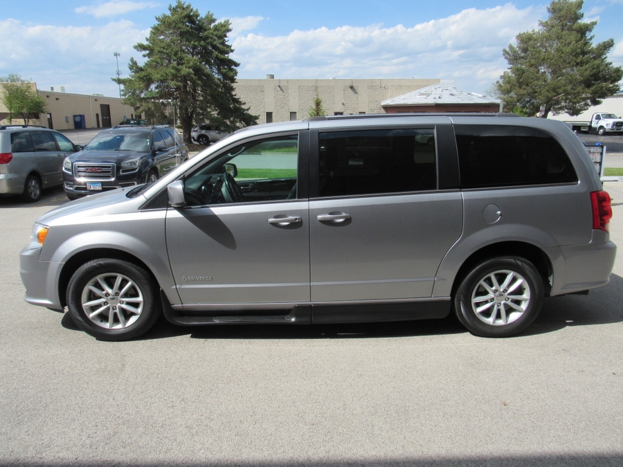 Silver Dodge Grand Caravan with Side Entry Automatic Fold Out ramp