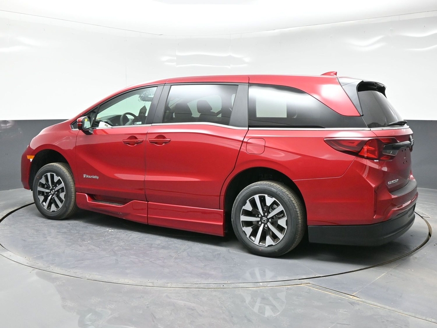 Red Honda Odyssey with Side Entry Automatic In Floor ramp
