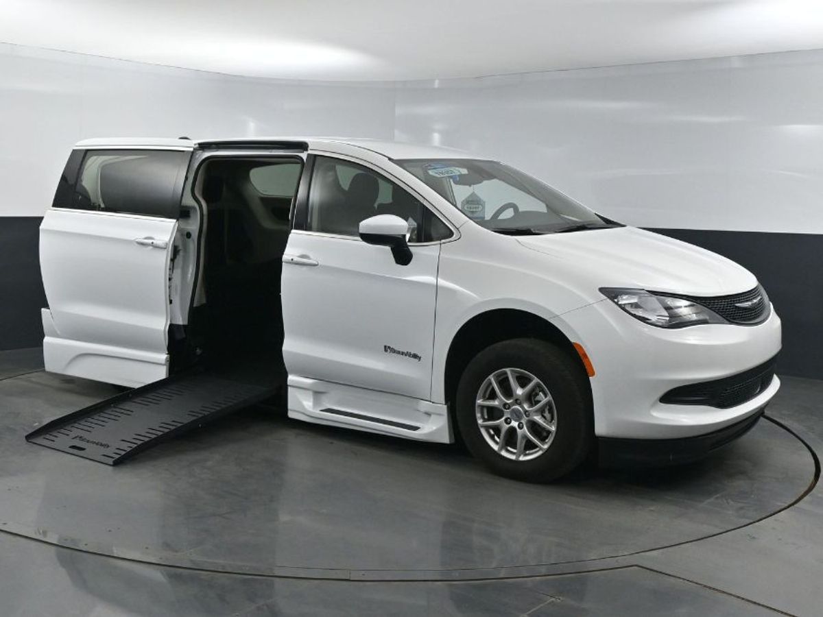 White Chrysler Voyager with Side Entry Automatic Fold Out ramp
