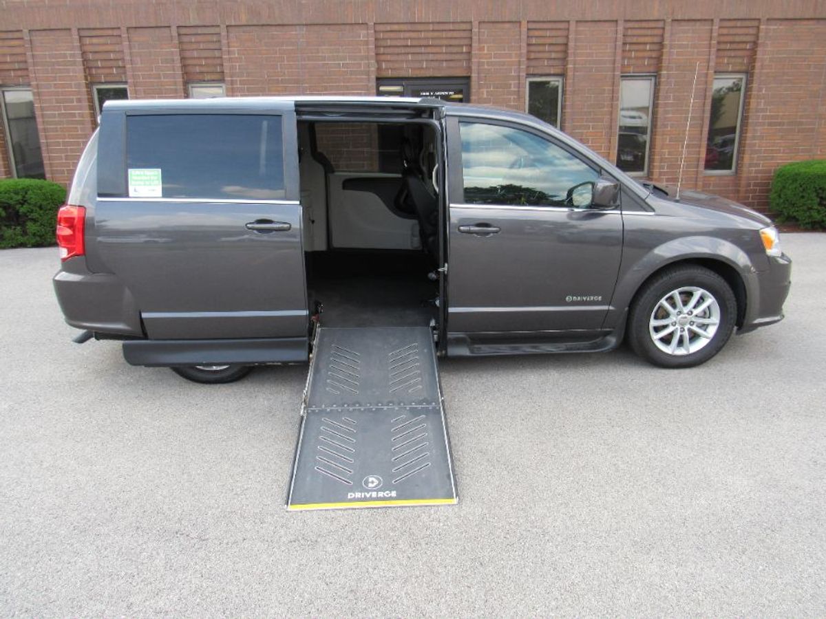 Grey Dodge Grand Caravan with Side Entry Automatic Fold Out ramp