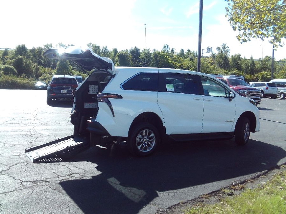 White Toyota Sienna with Rear Entry Manual Fold Out ramp