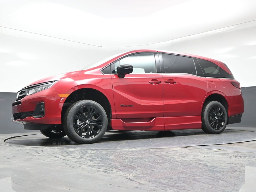 Red Honda Odyssey image number 16