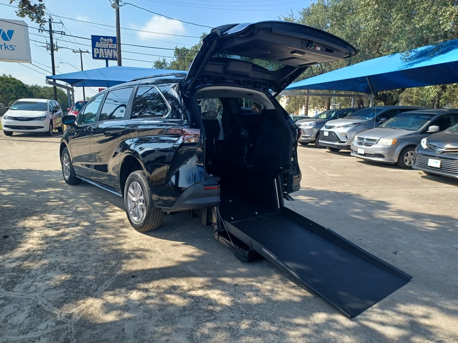 Black Toyota Sienna with Rear Entry Manual Fold Out ramp