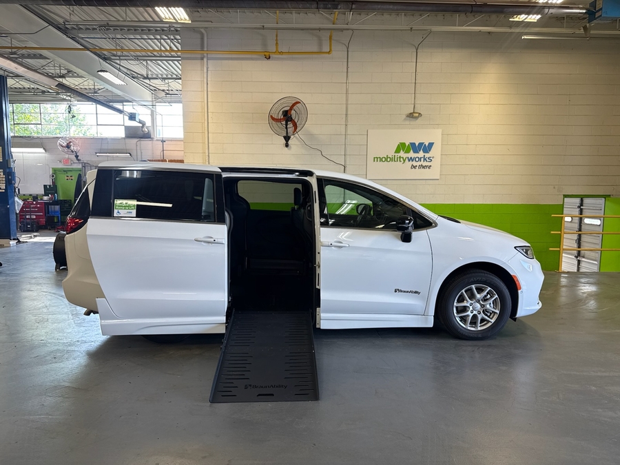 White Chrysler Pacifica with Side Entry Automatic Fold Out ramp