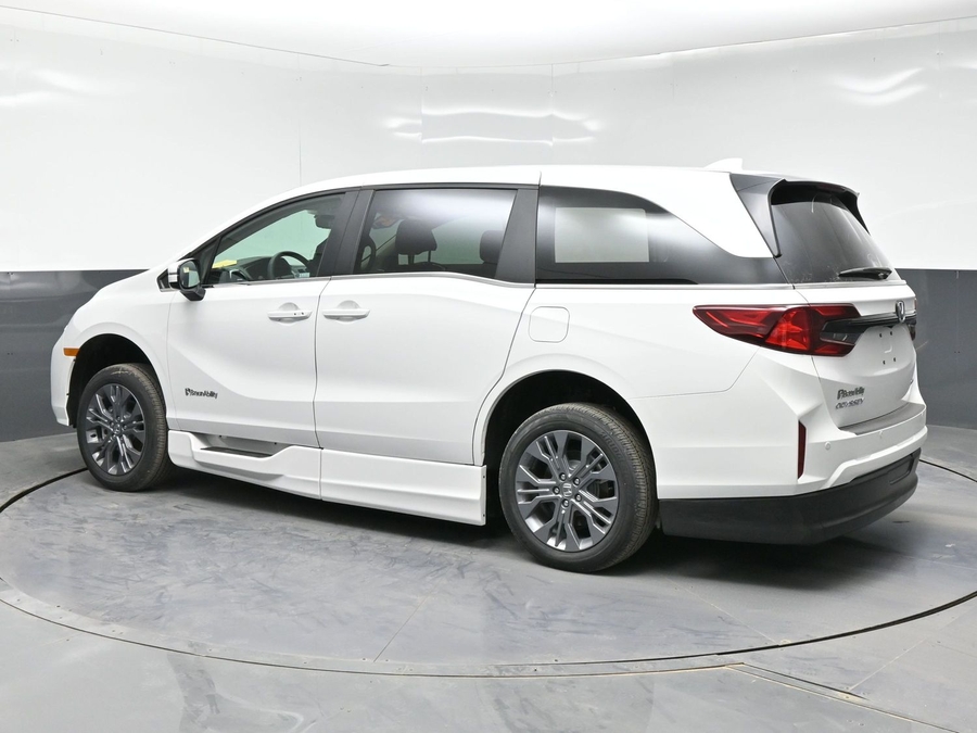 White Honda Odyssey with Side Entry Automatic In Floor ramp